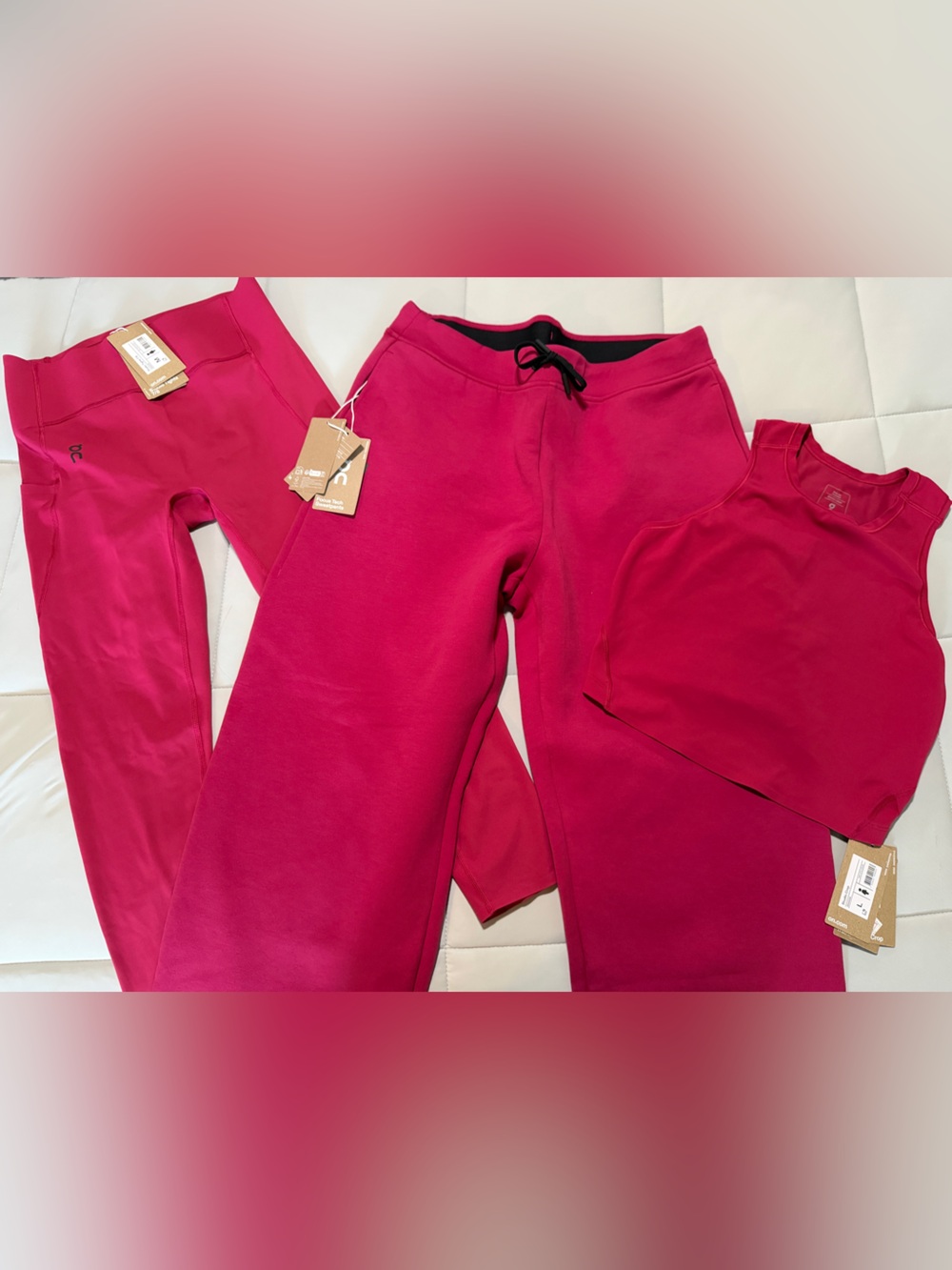 On set of tights M, sweatpants L, crop top L. Matching set, color is Grenadine